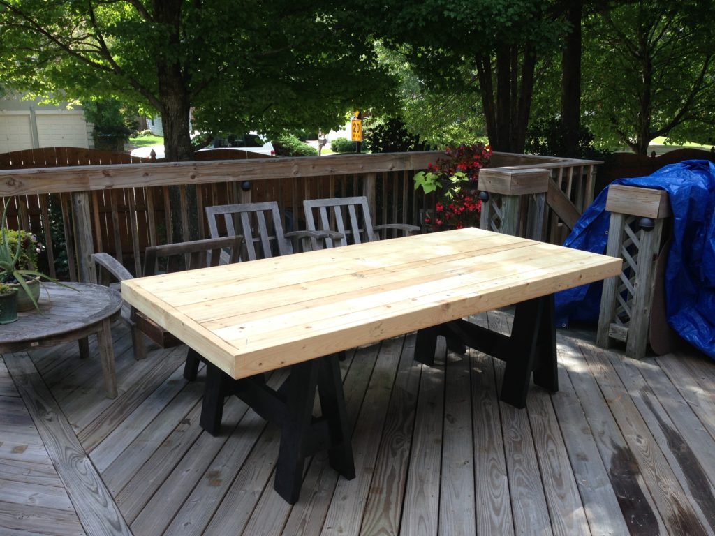 DIY Outdoor Dining Table - Easy to build huge dining table for the patio.