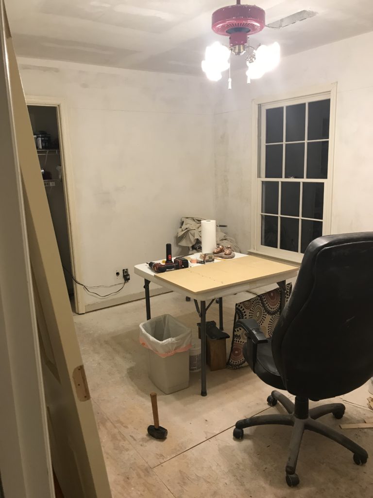 Removing old carpet, updating a room with laminate flooring, bedroom update