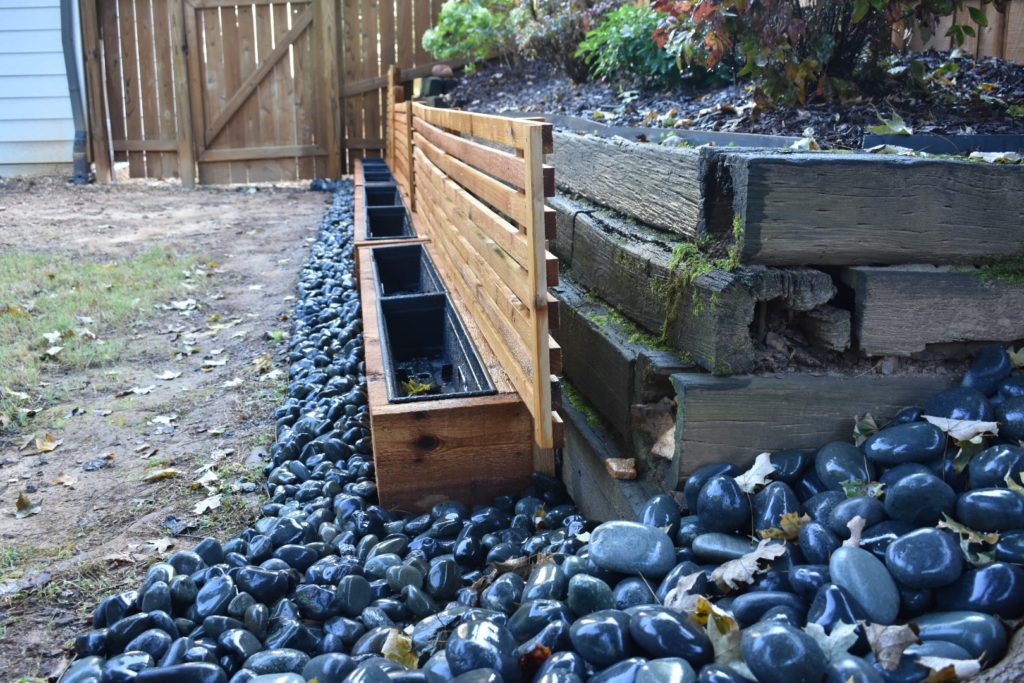 Backyard Makeover using DIY cedar planter boxes.