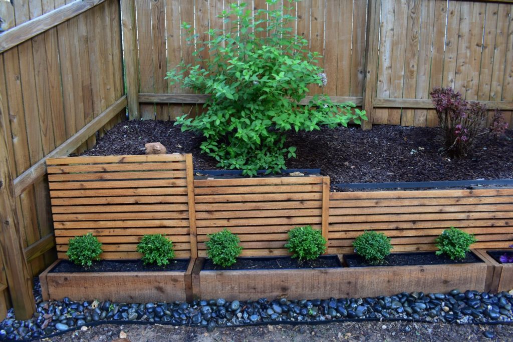 Backyard Makeover using DIY cedar planter boxes.