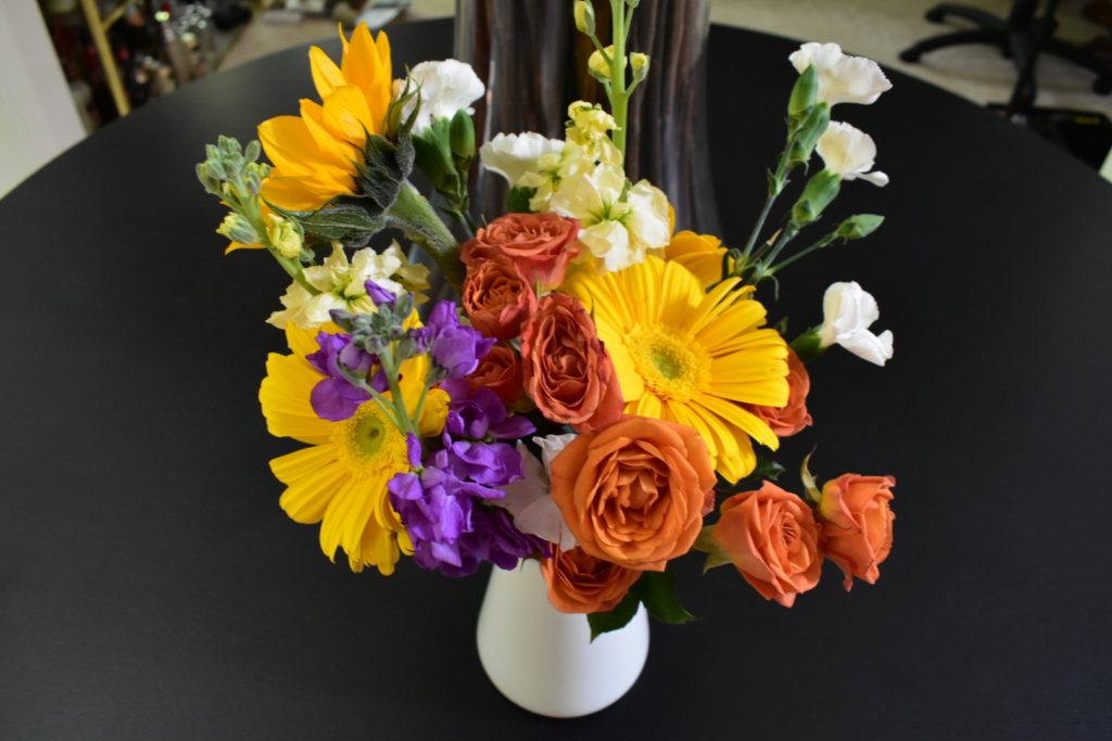 Easy Flower arrangements using grocery store flowers.