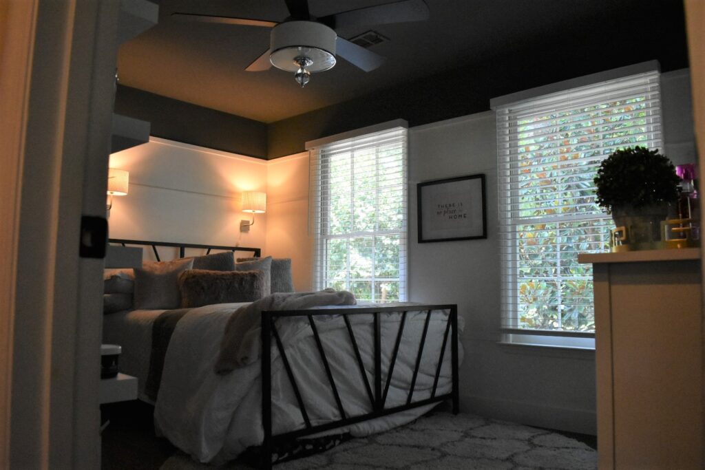 DIY Bedroom Makeover painting a ceiling with Benjamin Moore Kendall Charcoal. Dark Gray Ceiling Ideas